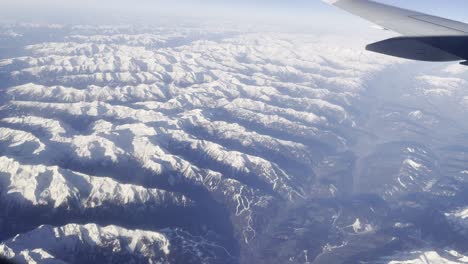 wast wilderness of european alps covered with snow in late spring