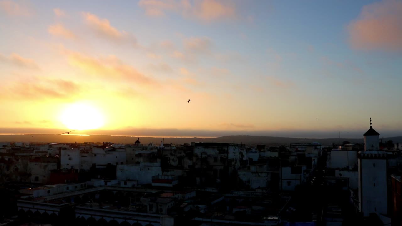 glorious sunrise captured from rooftop in Essaouira Morocco