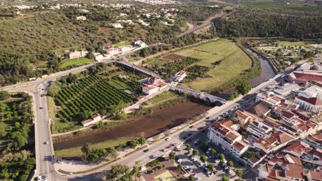 rotating aerial pan over the arade river in silves, portugal