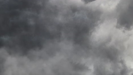 Lightning Flashing And Thunder in dark clouds
