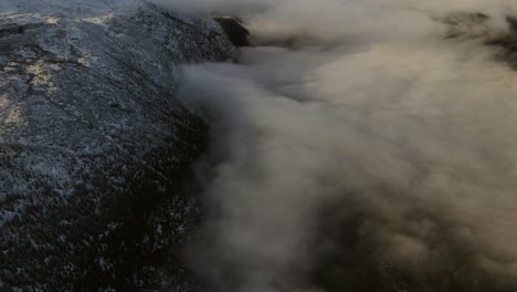 Panning-footage-of-valley-covered-by-clouds