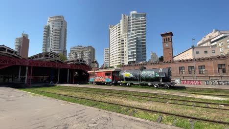 skyline of rosario argentina from the pichincha train tracks