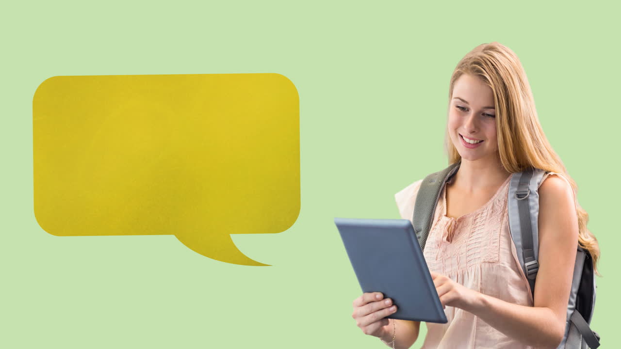 Animation of yellow speech bubble over caucasian teenage female student using tablet, on green