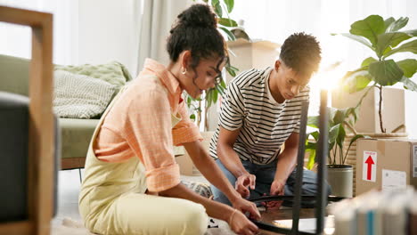couple assembling furniture in their new home