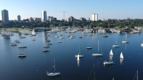 Drone-shot-of-sail-boats-in-Lake-Michigan-bay-in-downtown-Milwaukee-Wisconsin