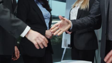 business partners shaking hands after making deal