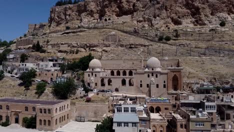 mardin, turkey, cinematic places and people activities - street view -  the zinciriye madrasa from the sky dji 4k
