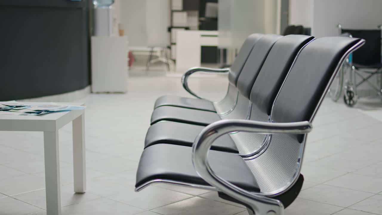 Clinical waiting area with seats in facility lobby