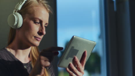 woman uses a digital tablet