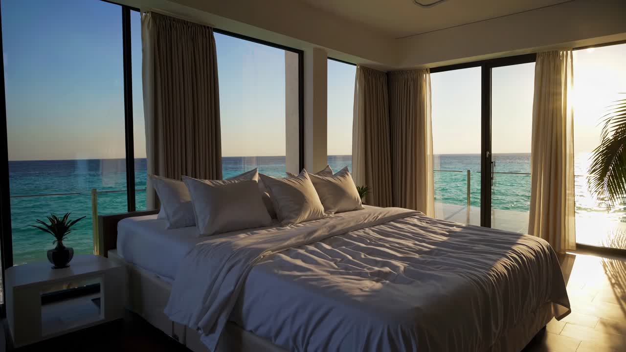 해가 지는 해변에 있는 럭셔리 침실