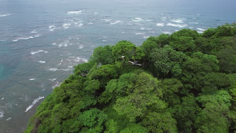 Aerial-view-of-abandoned-plane-in-the-hills-near-the-coastline-at-Samara-beach