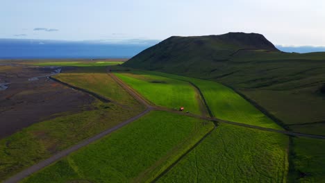 aerial view of lush green landscape near seljavallalaug in southern iceland