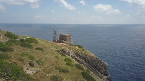 ancient naples fortification and light beacon under renovation in italy