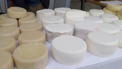 different delicious hand made organic cheese sold at a winter market in the north of portugal