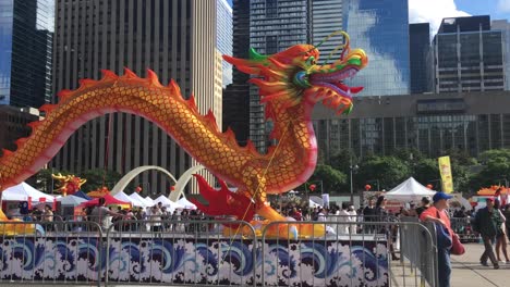 vibrant chinese dragon lantern display at an outdoor city festival