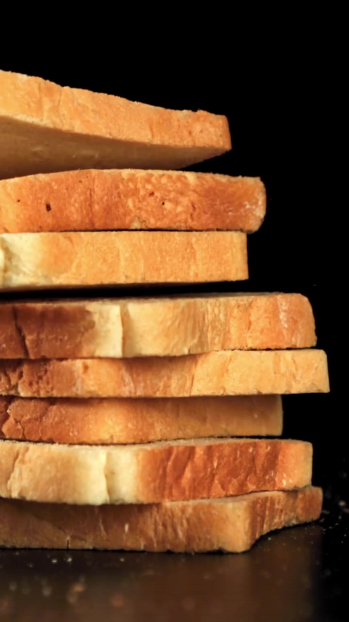 Slices of Bread Falling and Stacking in Slow Motion