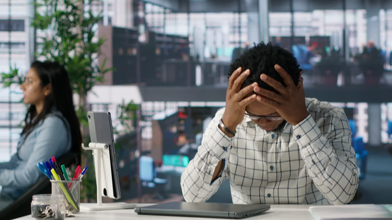 Man working on a laptop in an office