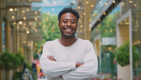 portrait of young male vlogger or social influencer travelling through city for social media