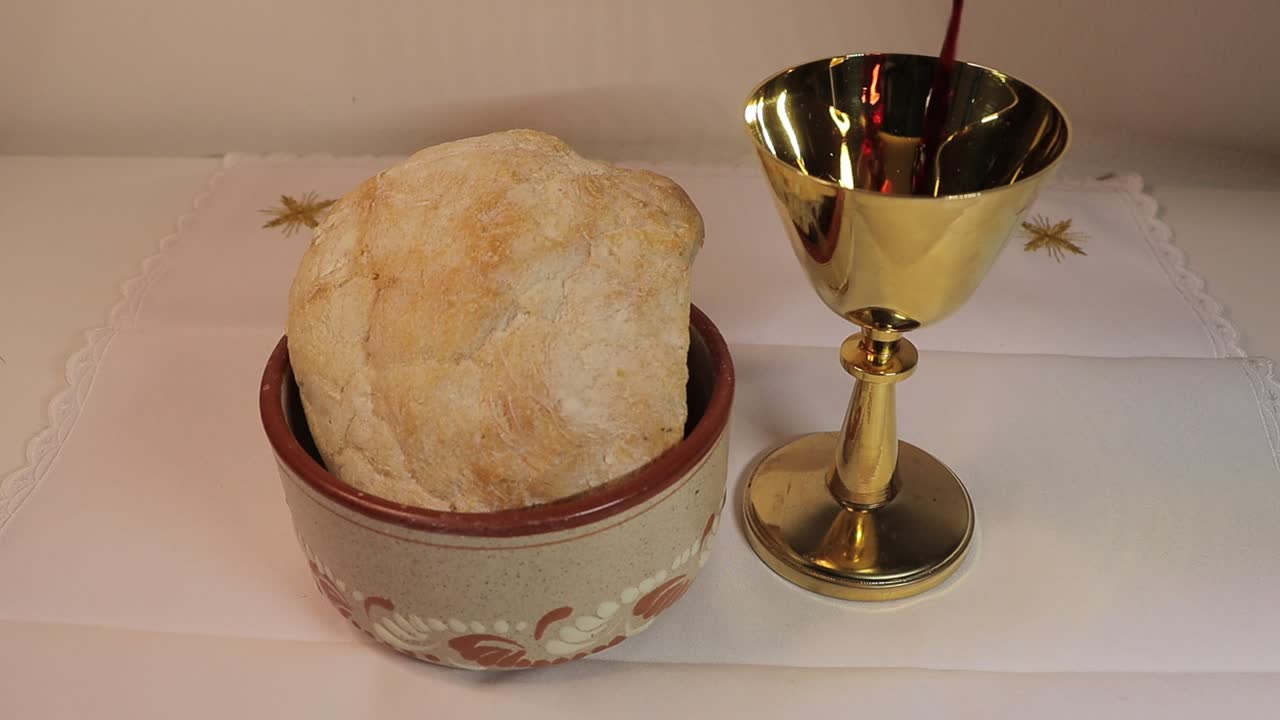 in the eucharist the love of jesus christ incarnate and transformed into bread and wine is presented from the wine and bread