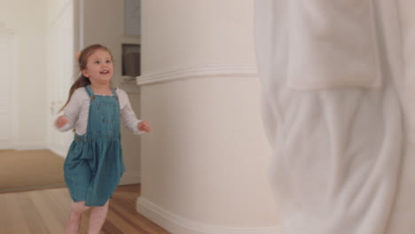 happy mother and daughter play catch running through house little girl playing game chasing mom enjoying fun weekend together 4k footage