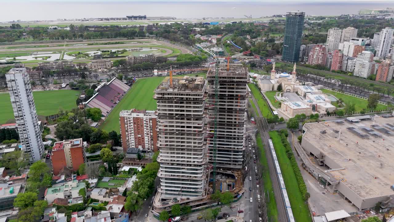 Aerial view of skyscrapers in Buenos Aires with lush greenery around