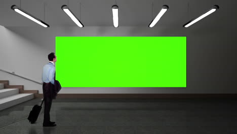 Businessman-looking-at-green-screen