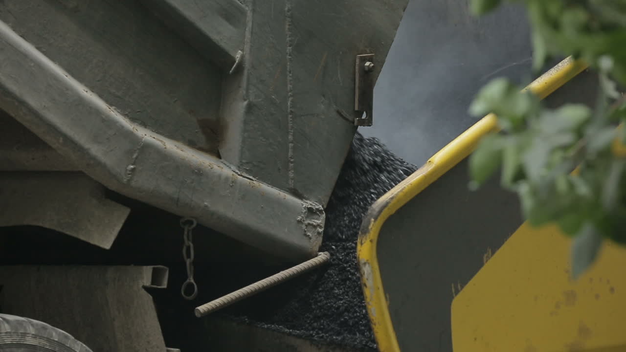 Tracked paver at asphalt pavement works for road repairing