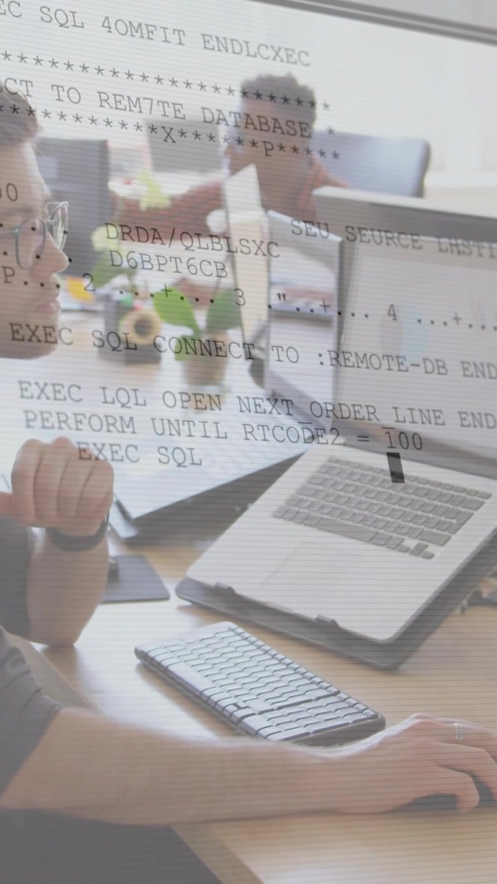 Vertical video: Dev shifting chin to mouse, creating data logs overlaying laptop chart for analysis