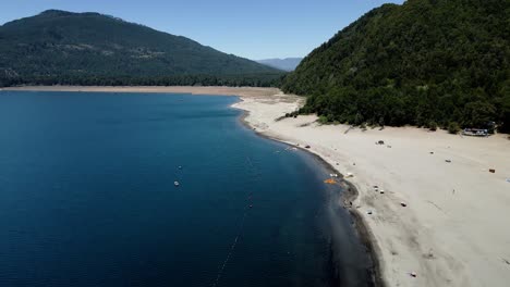 aerial view of the playa blanca at the caburgua lake in southern chile - drone shot