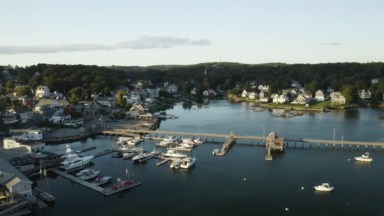 Gorgeous drone shot of boats docked at Boothbay Harbor, Maine.