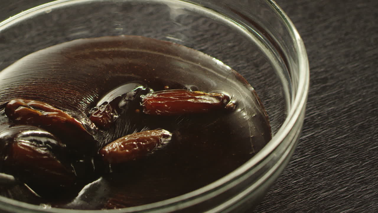 Cooking chocolate bar with date fruits. Homemade sweets