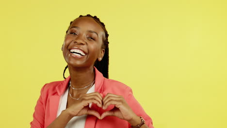 Heart-hands,-happy-and-love-with-black-woman