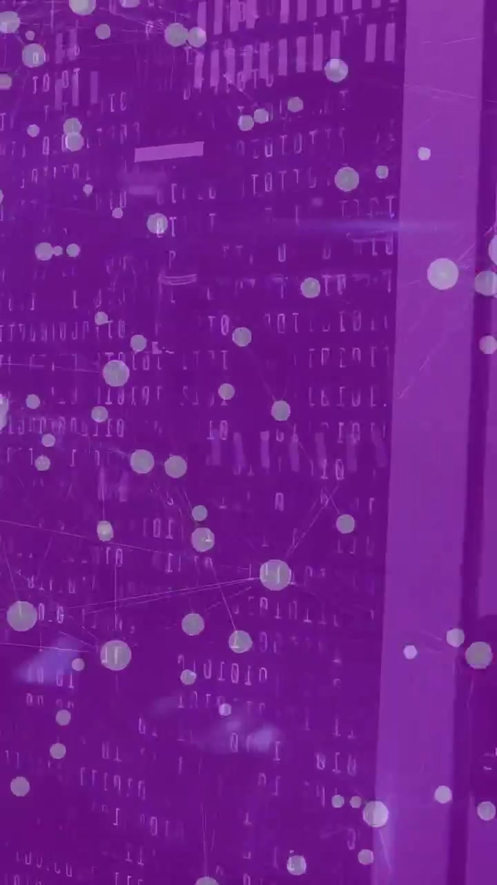 Vertical video: Network nodes drifting over purple tech rack, camera panning right revealing handle