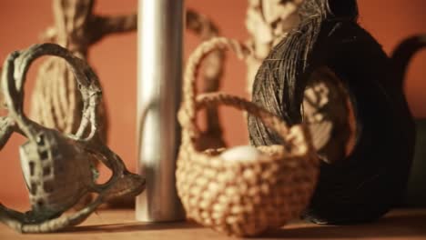 a creative display of unique artifacts and handmade crafts showcasing traditional techniques, textures, and forms set against a warm background