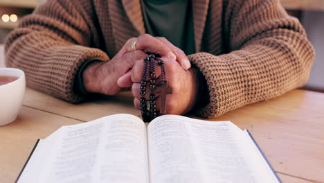 hands, cross and bible with praying