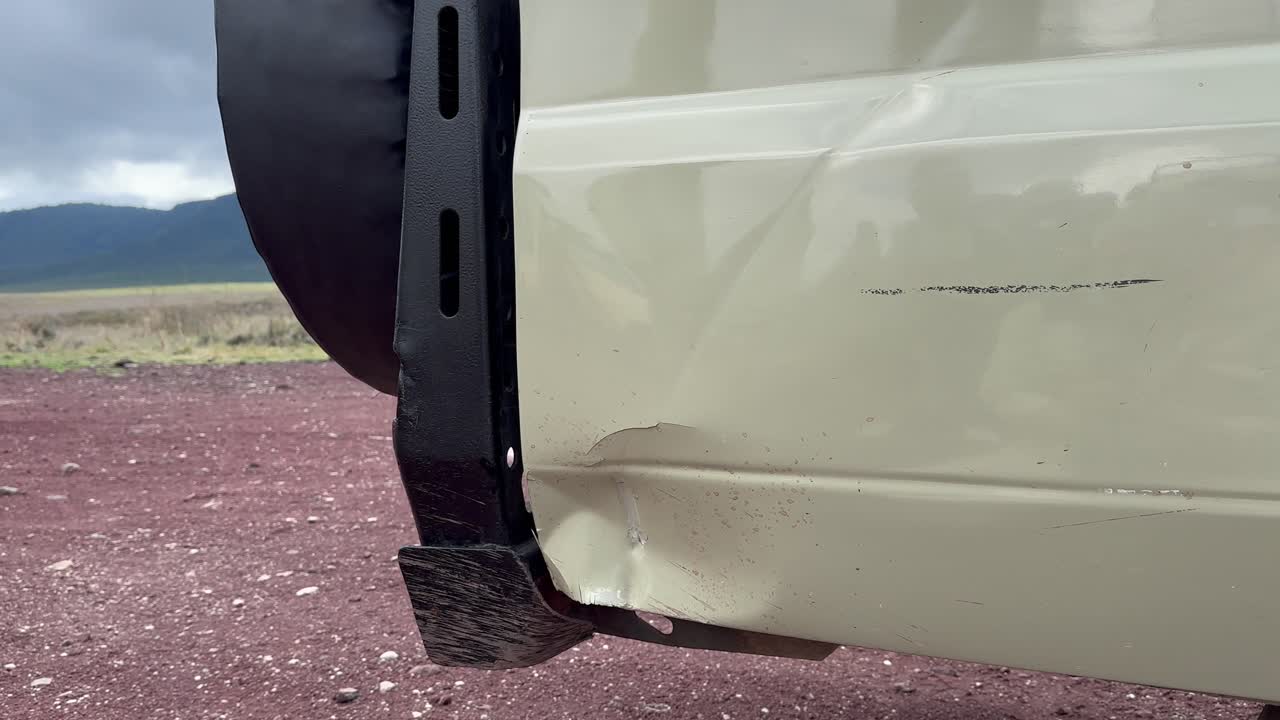 Damage done to safari vehicle by black rhinoceros in Ngorongoro Crater. Tanzania.