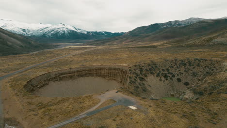 magnificent pozo de las ánimas nestled amidst the andes cordilleras, seamlessly bridging the natural beauty between argentina and chile