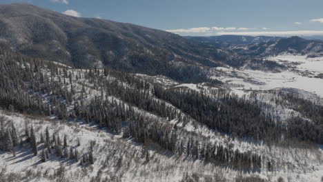 aerial tilting boom shot of the rocky mountains outside of steamboat springs