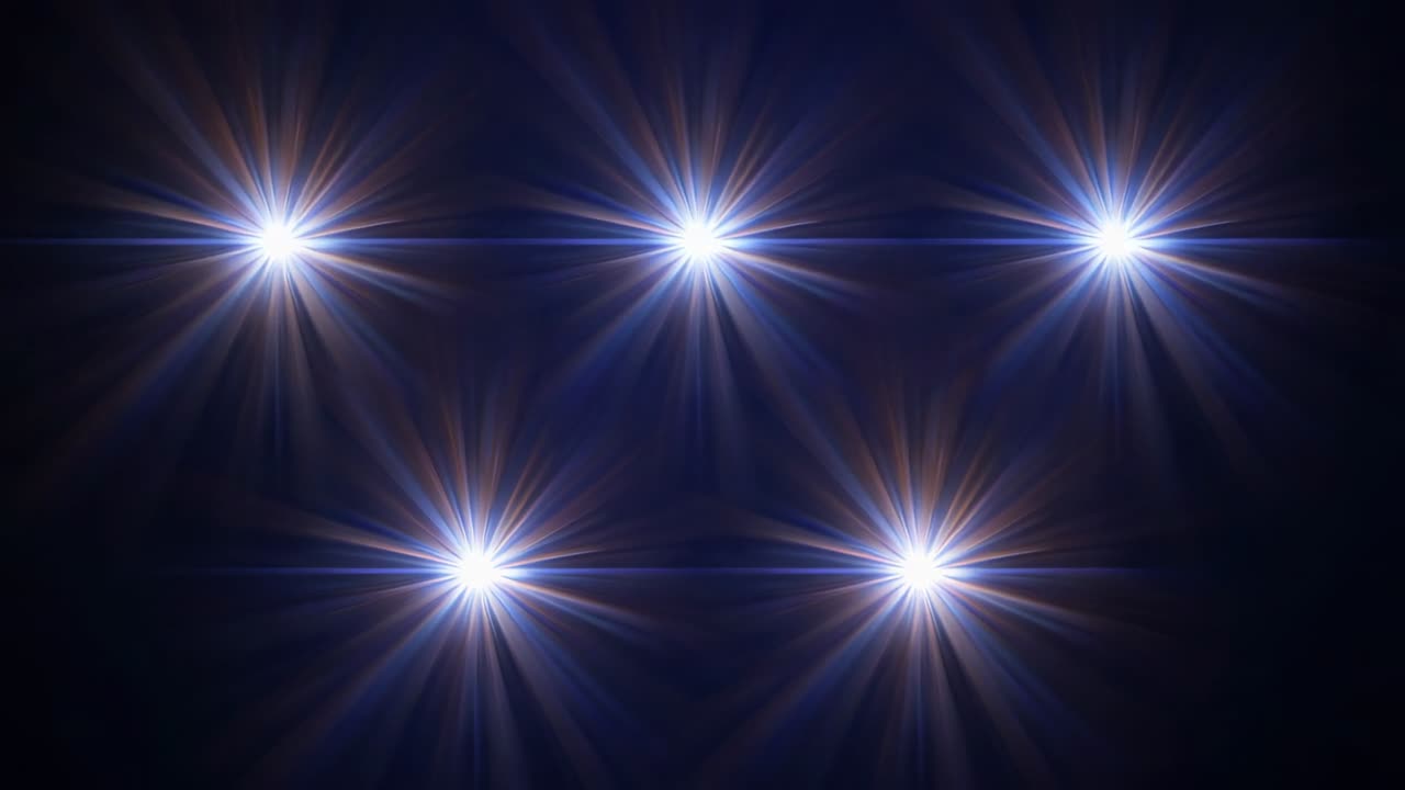 Emitting white-blue rays, five starburst light flares arranged three above two in pitch-black void
