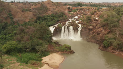 Flying-over-a-waterfall-in-kwanza-sul,-binga,-Angola-on-the-African-continent-12