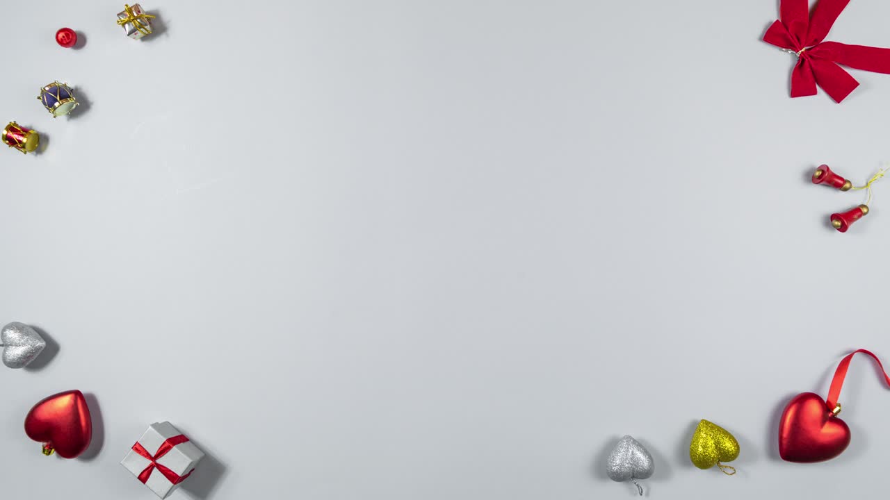 la caja de regalos con cinta roja aparece, se mueve dinámicamente en diferentes direcciones, luego las manos la atrapan. concepto de vacaciones y regalos.