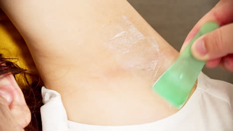 women use armpit depilatory cream for body hygiene to stay health