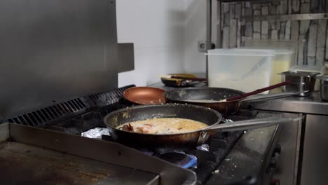 anonymous person seasoning dishes during dinner preparation in kitchen