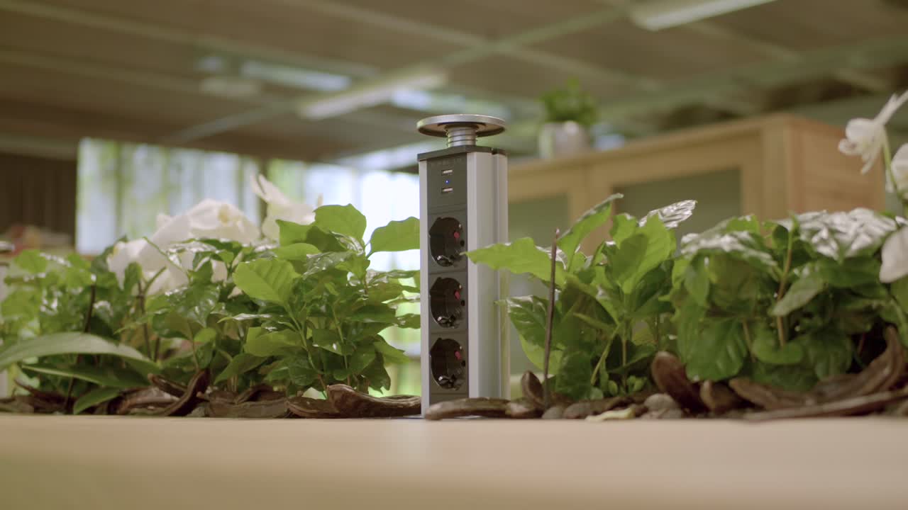 Renewable energy power socket on the table, today's modern technology