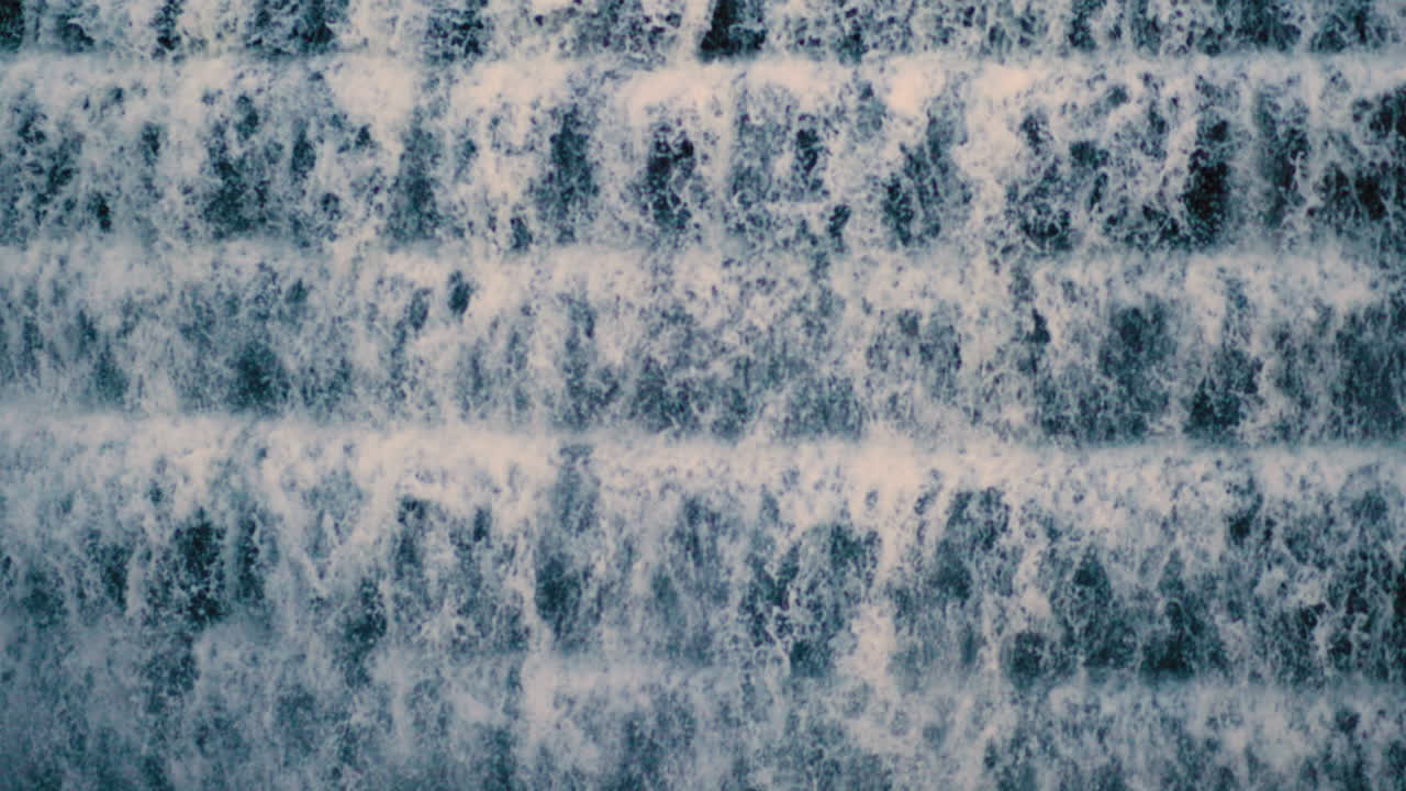 Close-Up of water flowing down a reservoir dam in New York