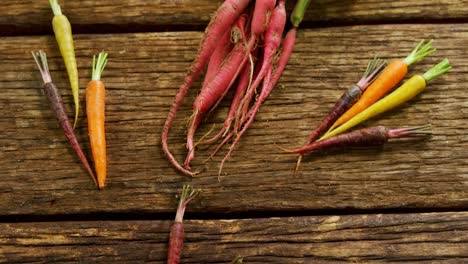 various root vegetables on wooden table 4k