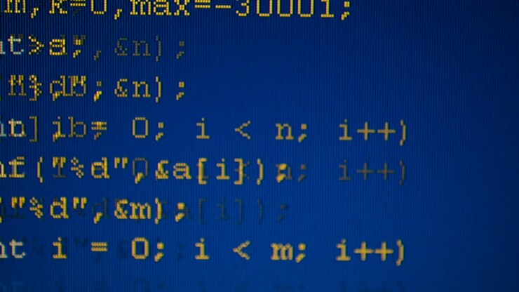 Source code on the monitor screen. Shooting of the text of the computer program