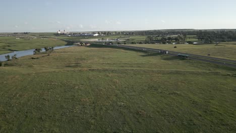 rotating aerial tracks highway traffic at vaal river in villiers, za