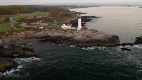 idyllic aerial view of beautiful portland headlight lighthouse on the coast of maine