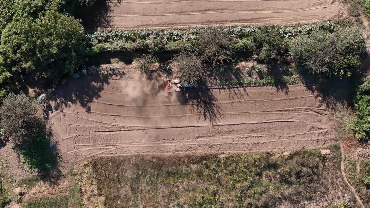 Tractor ploughing the farming field